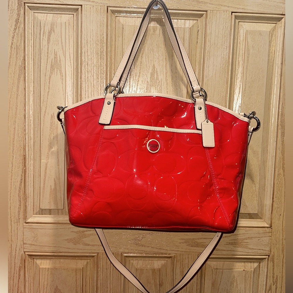 Gorgeous vibrant red and tan Coach bag